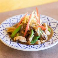 Pad Ginger · Stir-fried ginger, onions, mushrooms, bell peppers, and bok choy with house special mild sau...