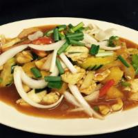 Pad Priew Wan (Sweet & Sour Sauce) · Stir-fried pineapple, cucumbers, tomatoes, onions, green peas, and bell peppers with sweet a...
