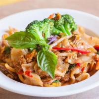 Pad Kee Mow (Chili Noodles) · Stir-fried wide-flat rice noodles with egg, onion, bell pepper, basil leaves, broccoli, carr...