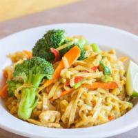 Curry Noodle · Stir-fried rice noodles with mixed vegetables, onion, bell peppers, and yellow powder with y...