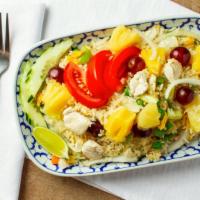 Pinapple Fried Rice · Stir-fried white rice with tofu or meat, pineapple, egg, onions, tomatoes, and mini mixed ve...