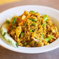 Yellow Curry Fried Rice · Stir-fried white rice with tofu or meat, egg, onion, bell pepper, mushroom, mini mixed veget...
