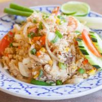 House Combination Fried Rice · A combination of chicken, pork, beef, and shrimp stir fried with white rice, egg, onion, tom...