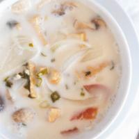  Tom Kha Soup · Spicy and sour coconut milk soup with mushrooms, tomatoes and pinons blended with lemongrass...