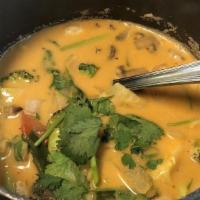 Yellow Curry · Served with your choice of protein in thai thai yellow curry sauce with potatoes, carrots an...