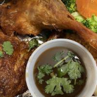 Crispy Duck · Crispy duck served with steamed broccoli, carrots and homemade orange zest sauce. Served wit...