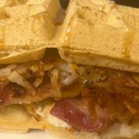 Thick Thick · Thick waffle with egg, pepper jack cheese and grass fed sausage, grass fed bacon and our sig...