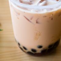 Qq Family Milk Tea/Qq大家族 · Black milk tea with Jelly, red beans, and tapioca pearls