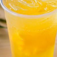 Passion Fruit & Mango/百香芒果 · Passion fruit and mango green tea served with fresh mango slices and passion fruit