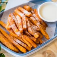 Sweet Potato Fries With Plum Seasoning/甘梅红薯条 · Crispy sweet potato fries served with a dipping sauce