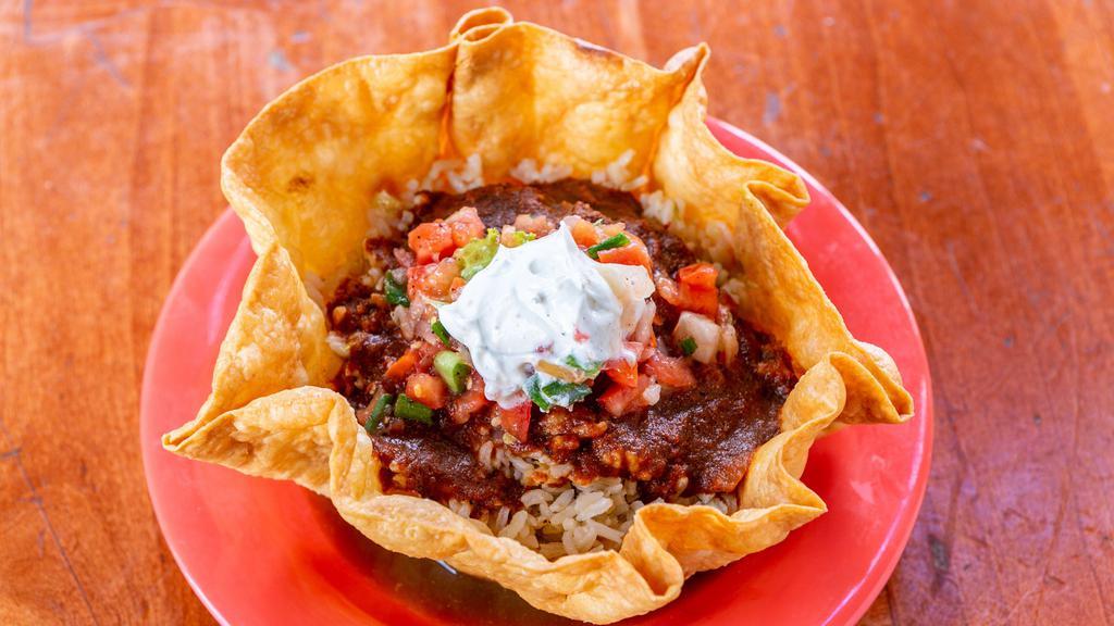 Burrito Bowl · Choice of rice beans & meat covering with enchilada sauce, cheese, salsa and sour cream