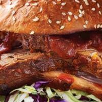 Bbq Brisket Burger · Beef patty with chopped smoked brisket, cheddar cheese, fried onions, bacon, and bbq sauce o...