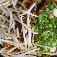 Pad Thai · Stir-fried rice noodle, egg, green onion, bean sprout with house pad Thai sauce.