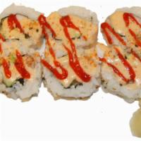 Spicy Crab Roll · California roll topped with spicy mayo and chili powder