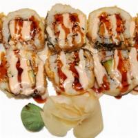 Tempura Philly Roll · Deep fried Philly roll topped with spicy mayo and sushi sauce