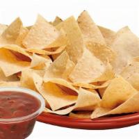 Chips & Salsa · Hand crafted tortilla chips served with a side of fresh salsa.