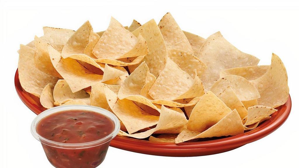 Chips & Salsa · Hand crafted tortilla chips served with a side of fresh salsa.
