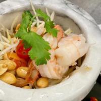 Papaya Salad (Som Tum) · Served with Shrimp, string Beans, Shredded Papaya, cherry tomatos,and Peanuts in spicy tangy...