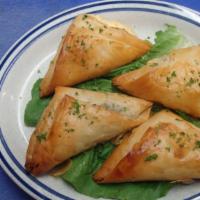 Spanakopita Pastries · Spinach and feta mixture stuffed in phyllo dough, baked  - 3 pieces