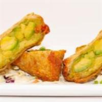 Avocado Eggrolls · House made eggrolls filled with fresh avocado, sundried tomatoes, red onions, cream cheese, ...