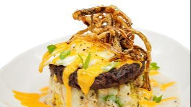 Hendertucky Moco Loco · Grilled Angus steak patty, chicken fried rice, house-made gravy, fried eggs and spicy aioli topped with cripsy fried onions