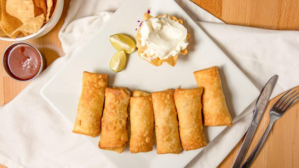 Mini Chimis (6) · Served with your choice of guacamole, sour cream or jalapeno cream cheese.
