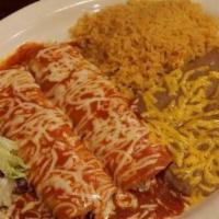 Tamale & Cheese Enchilada · Tamale of your choice. Cheese enchilada topped with your choice of enchilada sauce. Served w...