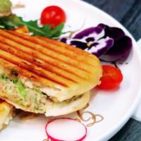 Tuna Panini · Crispy panini within provolone cheese and tuna salad (tuna, egg, celery, onion, avocado, may...