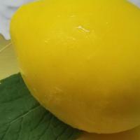Lemon Mousse · Lemon flavor mousse with white chocolate shell and real lemon skin filling.