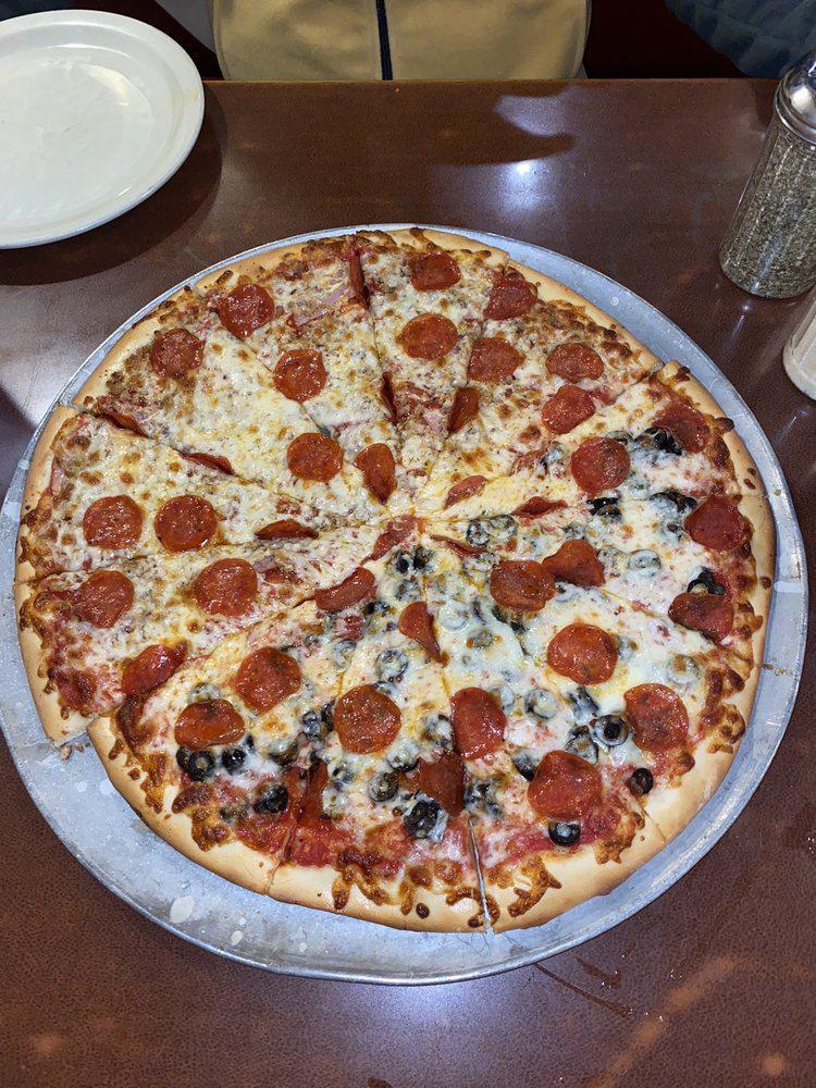 Zio's Pizzeria · Pizza · Italian · American · Salad