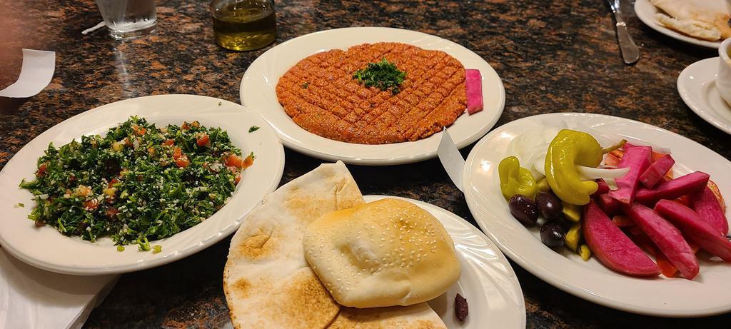 Grape Leaves Restaurant · Middle Eastern · Salad · Sandwiches · Coffee & Tea · Seafood