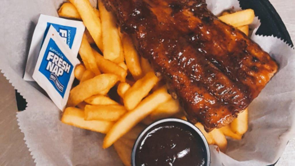 Rib Basket · A smaller portion of our anyway’s famous ribs served in a basket with French fries & a side of BBQ sauce.