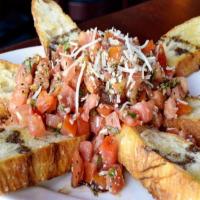 Bruschetta · Plum tomatoes, garlic, and basil tossed in olive oil & balsamic vinegar. Served on grilled I...