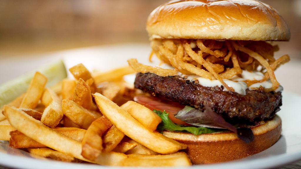 Bistro Burger · Certified Angus beef burger seasoned with cracked black pepper and topped with creamy blue cheese and crispy onion straws. Served on a grilled butter bun with creamy dijonnaise sauce, spring mix, & sliced tomatoes.