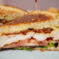 Grilled Chicken Club · Grilled chicken breast, creamy havarti cheese, baby greens, crispy bacon, sliced tomatoes, &...