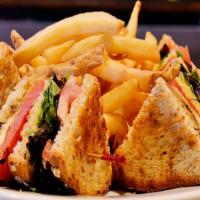 Grilled Portabella Club · Grilled marinated portabella, roasted red pepper, mozzarella cheese, mixed greens, tomatoes,...