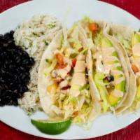Shrimp Avocado Tacos · Three flour tortillas filled with grilled shrimp, shredded lettuce, fresh pico de gallo, and...