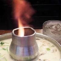 Tom Kha Soup · Choice of chicken or shrimps or tofu in spicy sour coconut milk soup with mushroom, onion an...