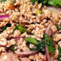 Larb Chicken · Mild. Ground chicken with a variety of flavors and textures of herbs.