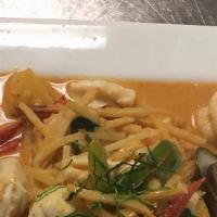 Seafood Curry · Spicy. With steamed rice. Shrimps, squids, fish, scallop and green mussels, bell pepper, pin...