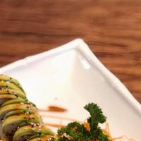 Dragon Roll · Cooked. Inside out. Tempura shrimp, avocado, asparagus, scallion and avocado on top.