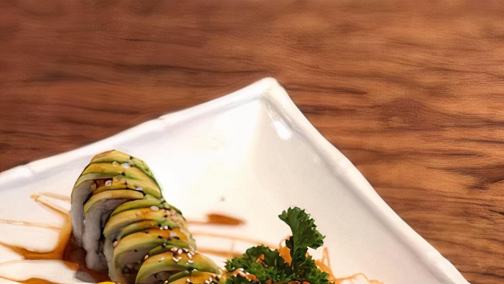 Dragon Roll · Cooked. Inside out. Tempura shrimp, avocado, asparagus, scallion and avocado on top.