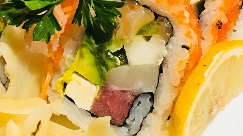 Delight Roll · Inside out. Tuna, salmon, yellowtail, cucumber, scallion, avocado, asparagus, cream cheese, inside out sesame seed, flying fish roe.