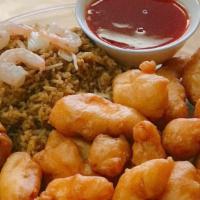 Sweet And Sour Chicken Or Shrimp Dinner Combo 甜酸 · Sauce on the side. Served with fried rice and egg roll.