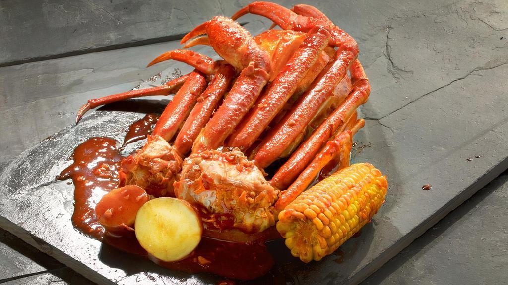 Crab Legs · Snow Crab clusters have juicy meat with a perfect balance of garlic, lemon pepper, and cajun spices. Served with corn and potatoes.
