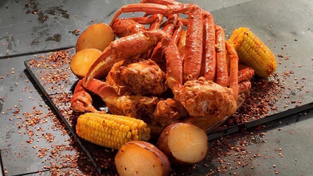 Crab Legs · Snow Crab clusters have juicy meat with a perfect balance of garlic, lemon pepper, and cajun spices. Served with corn and potatoes.