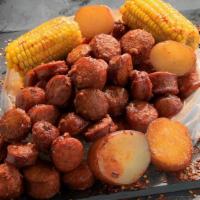Sausage · Spicy Andouille Sausage boiled with a perfect balance of garlic, lemon pepper, and cajun spi...