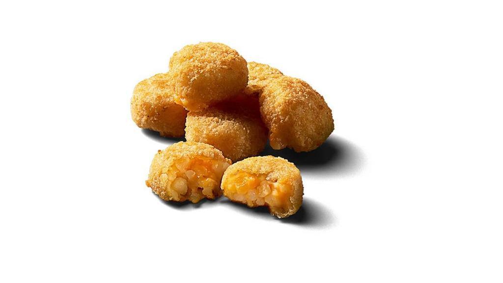 Potato Cheese Bites · Finely chopped potato with cheese breaded in a crispy, golden brown coating.