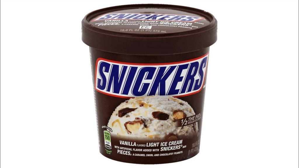 Snickers Ice Cream Pint · A classic candy bar in ice cream form! Enjoy a creamy blend of Snickers bar pieces, caramel swirl and chocolatey peanuts. Artificial flavors added. 1 Pint.