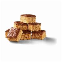 Peanut Butter Crispy Bites · Bars made with creamy peanut butter, blended with crisped rice and topped with mouthwatering...
